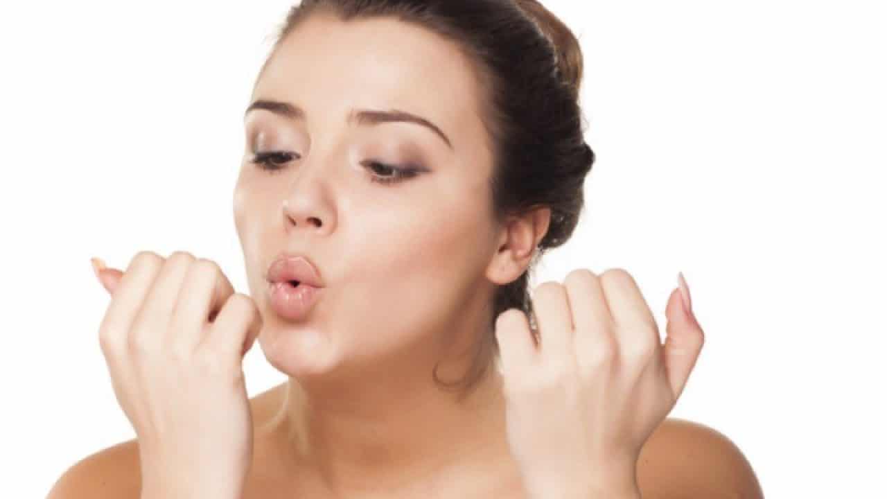 blowing on nails