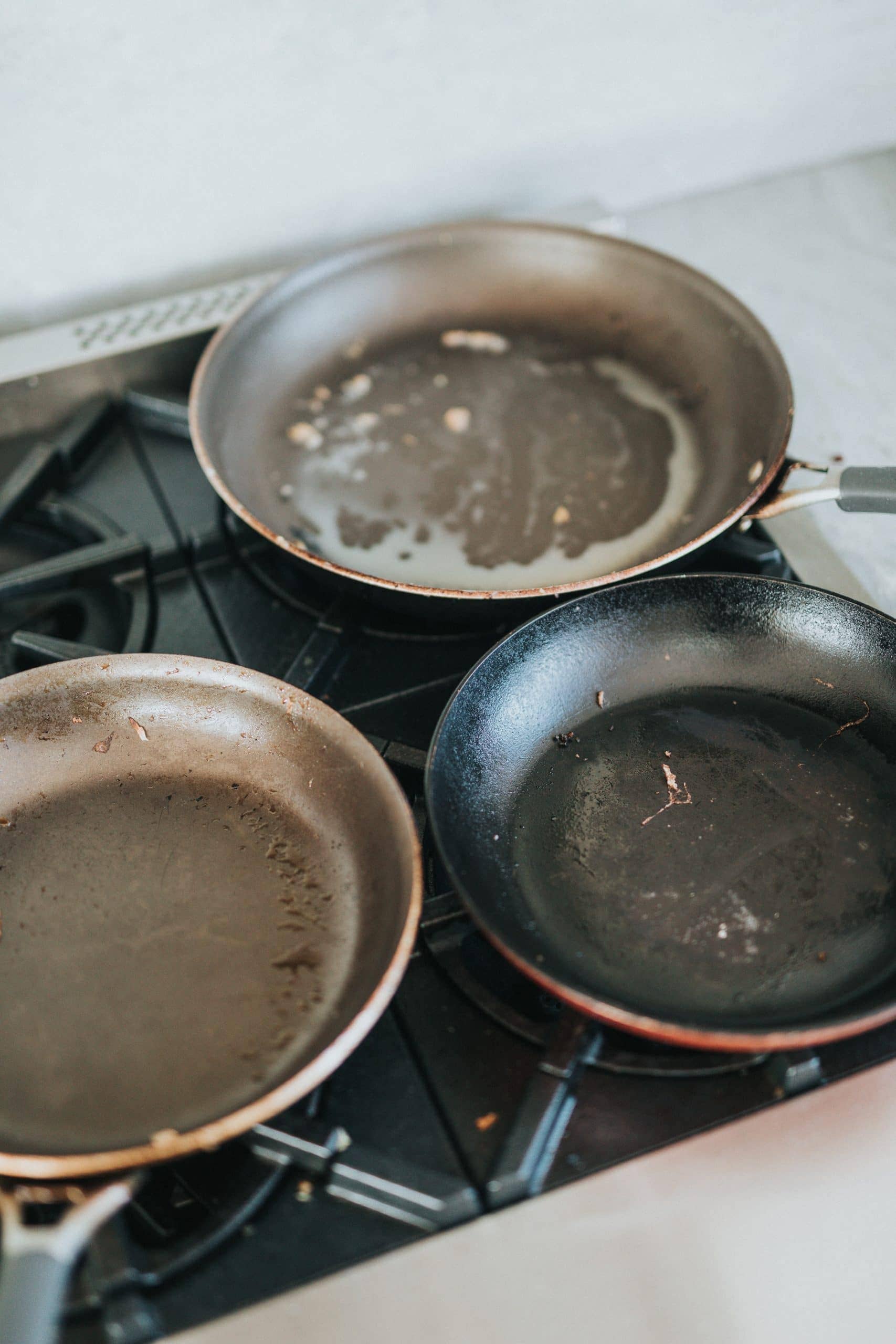 How to remove burnt-on grease from a non-stick pan