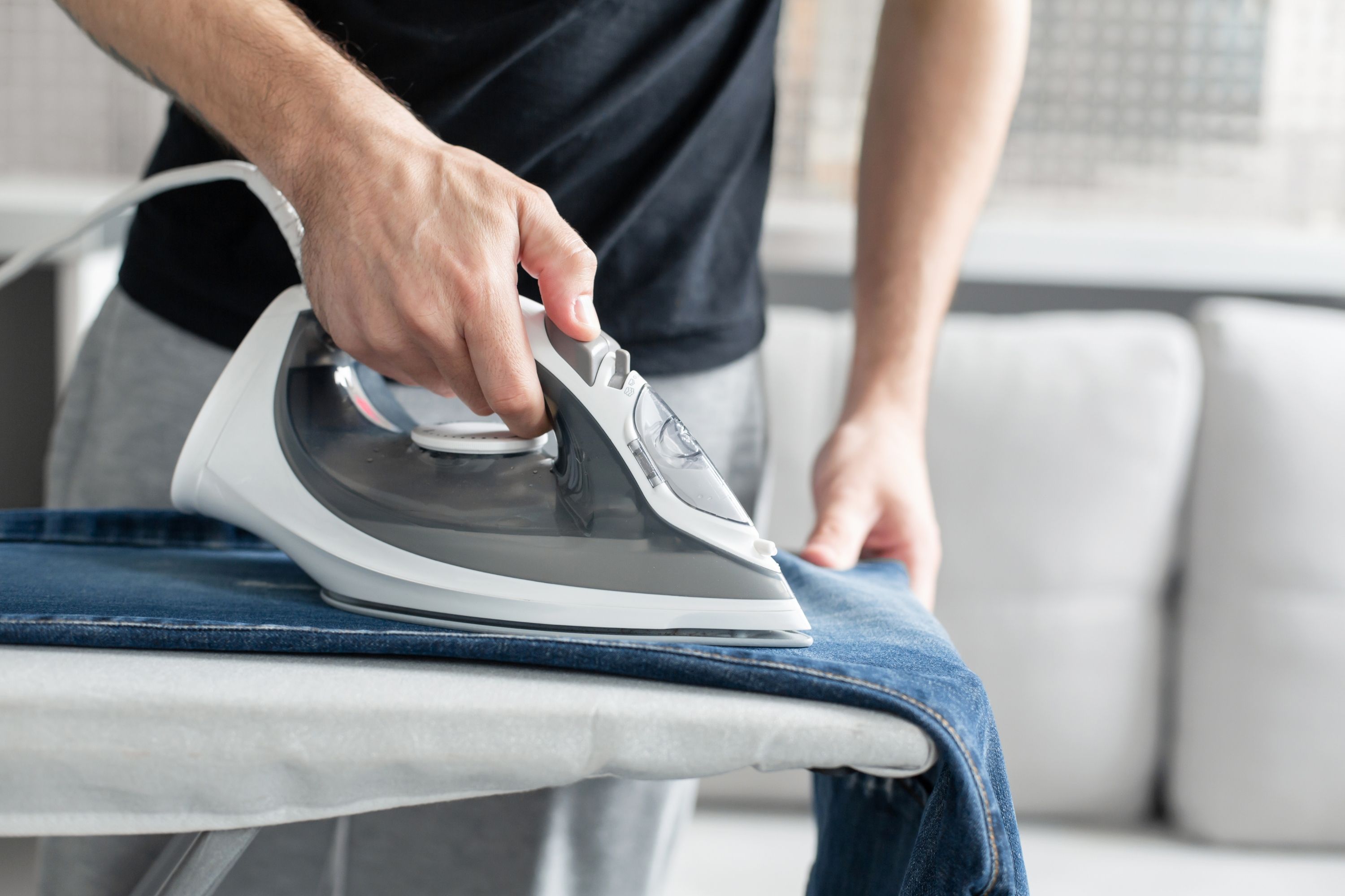 Guy Ironing clothes