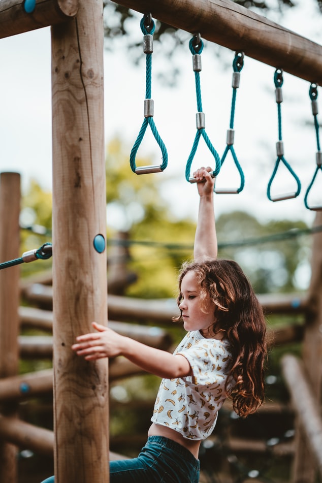 kid playing in the yard