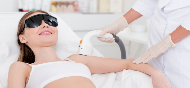 A woman getting laser therapy