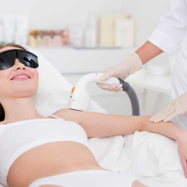 A woman getting laser therapy