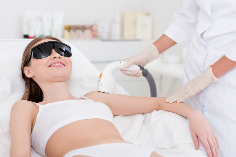 A woman getting laser therapy