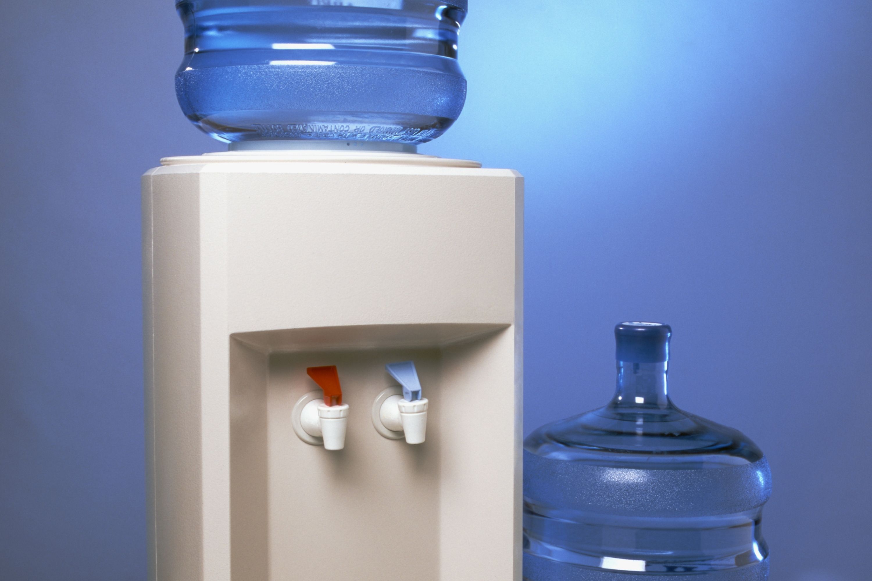How to Remove a Full Water Bottle From a Water Cooler