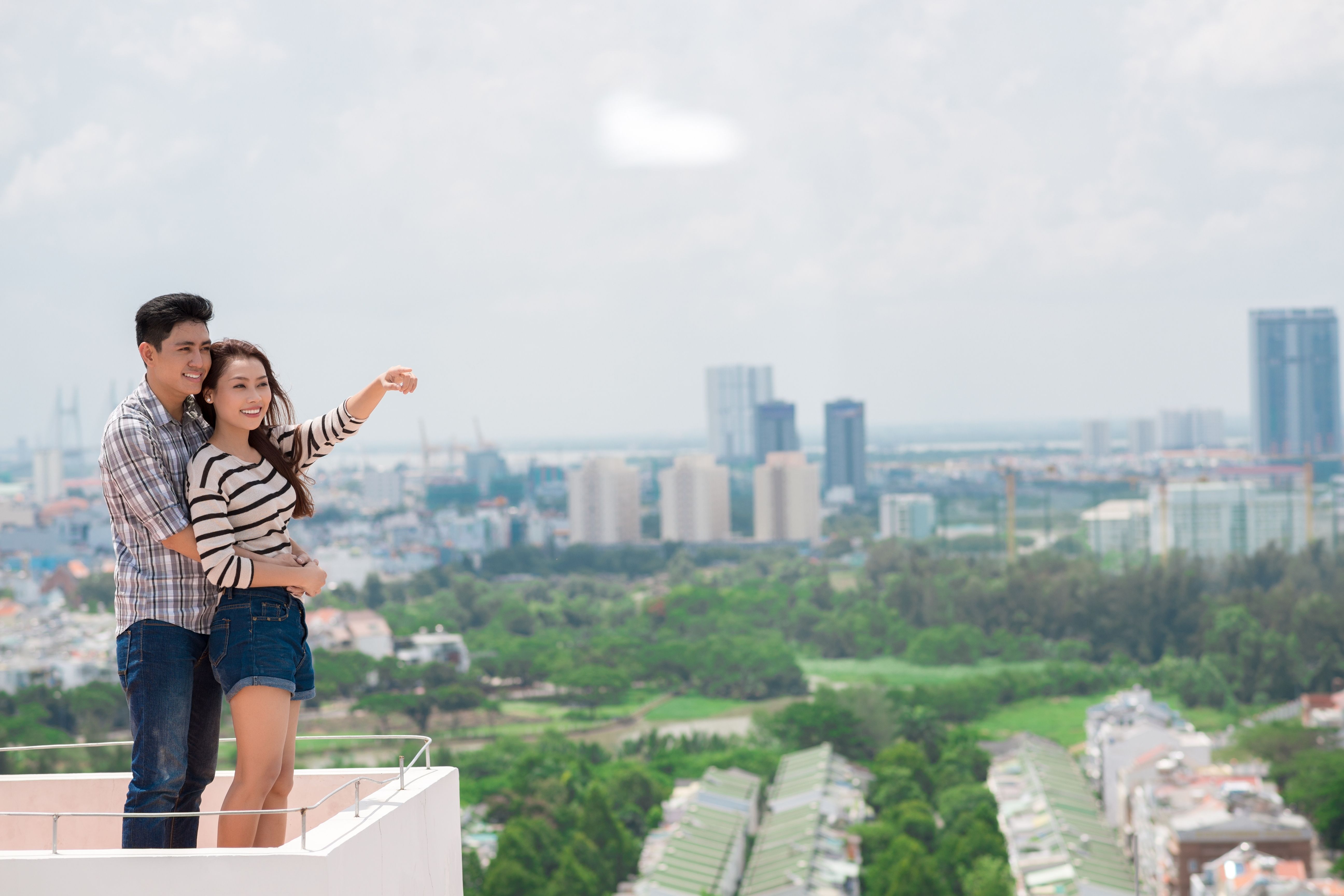 In front of a cityscape