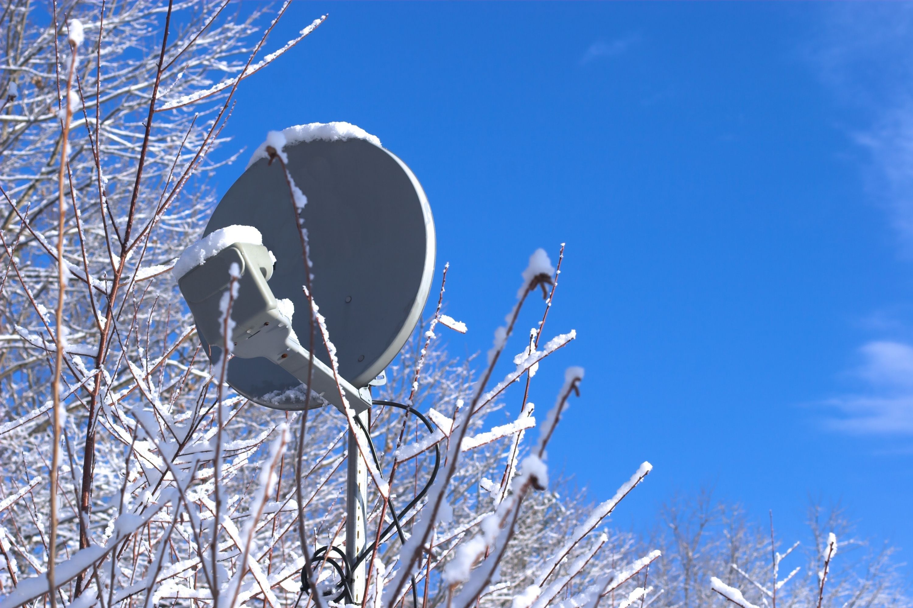 How to Get Snow Off a Satellite Dish On My Roof With Water Guns