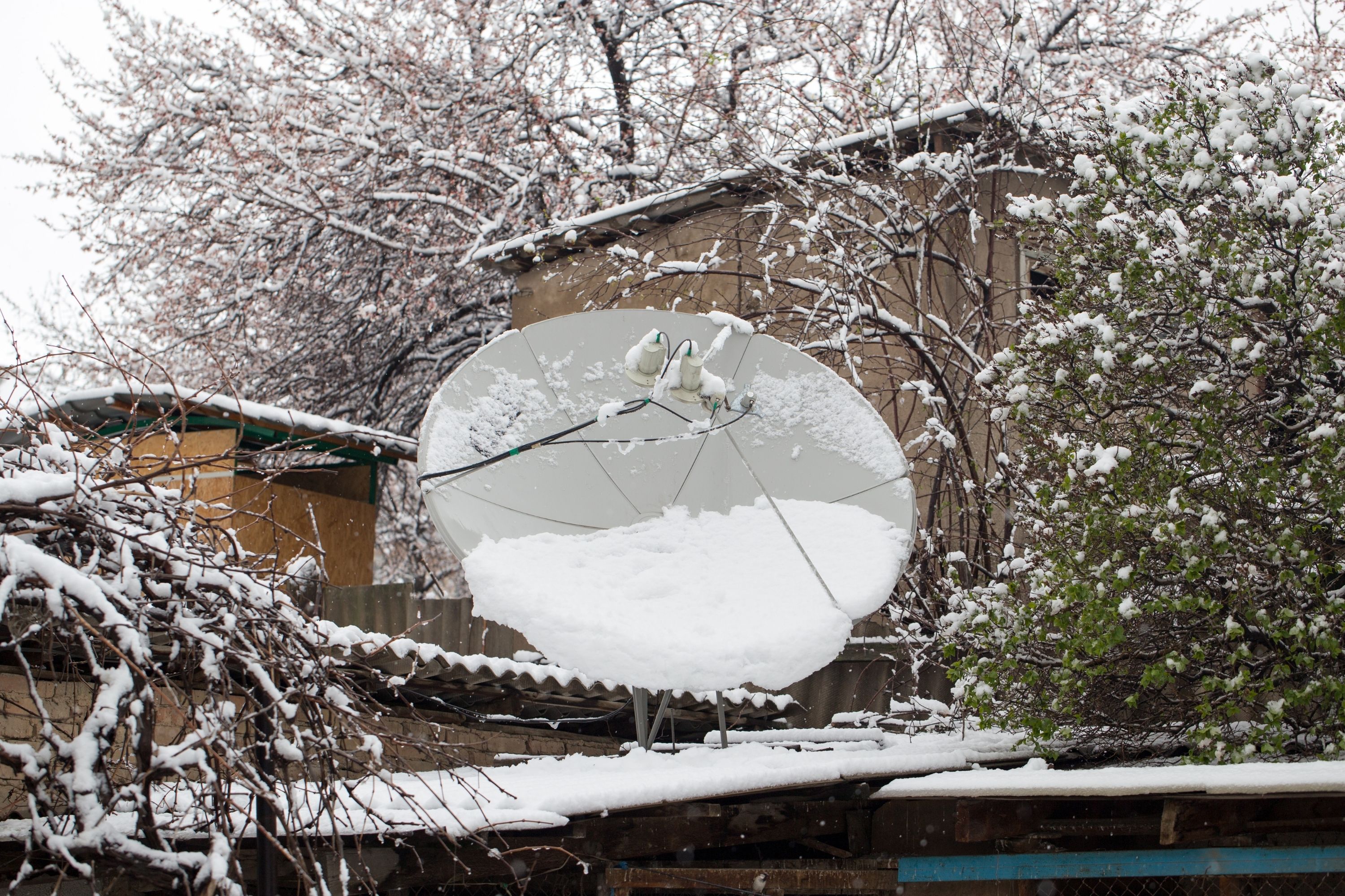 How to Keep Snow Off a Satellite Dish Using Heat Tapes