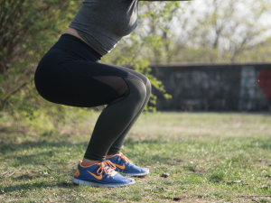 Woman doing squats for pelvic strength