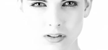 Close-up of a radiant, glowing face.