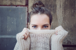 A young girl with smooth, clear skin.